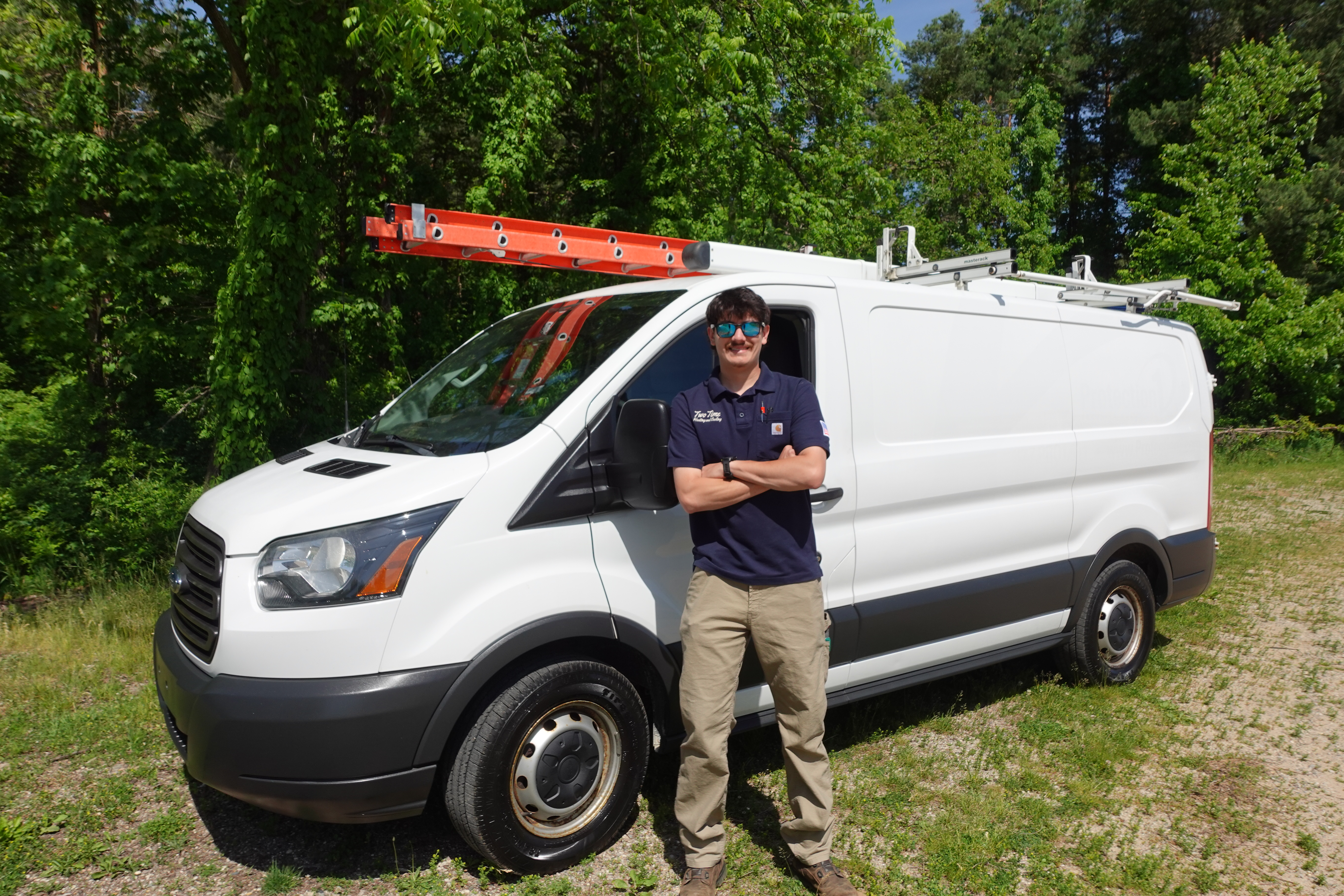 Noah Pizzala with Two Time Heating and Cooling service van
